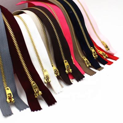 China Sustainable High Quality Customized Brass Gold Metal Zipper For Jeans for sale