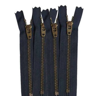 China Viable factory directly supply 3# metal to close end gold teeth garment zipper for pants for sale