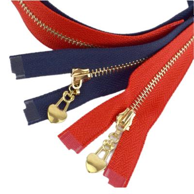 China Sustainable High Quality Golden Y Teeth Metal Zipper For Clothing for sale