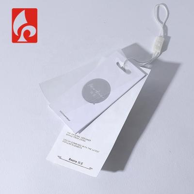 China Viable Customize Hang Tags Garment Hang Tag String Paper Clothing Hang Tag for sale