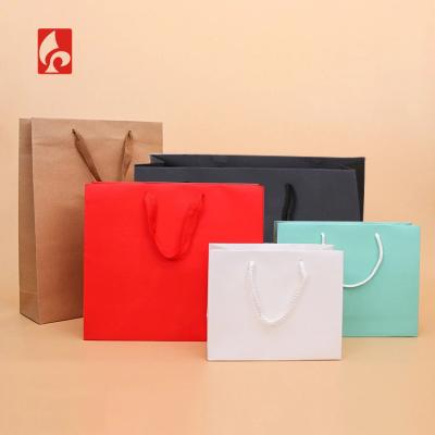 China Recyclable Brown Paper Bags With Handles Shopping Bag Paper Tissue Retail Waxed Paper Bags for sale