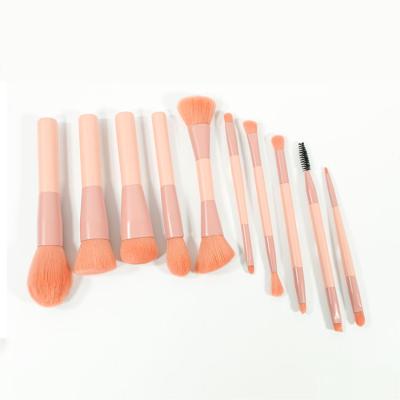 China Double Fan Brush Double Ended Face Tip Wooden Makeup Brush 10pcs Pink Finished Kit for sale