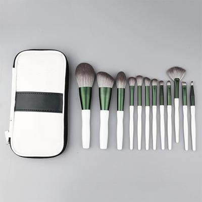 China Retractable Halal Makeup Brush Green Hair Fan Brush Logos 12pcs Professional Makeup Brush for sale