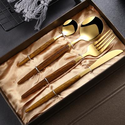 China Viable Luxury Flatware Spoon Knife Fork With Gift Box Silver And Gold Wood Handle Stainless Steel Cutlery Sets for sale