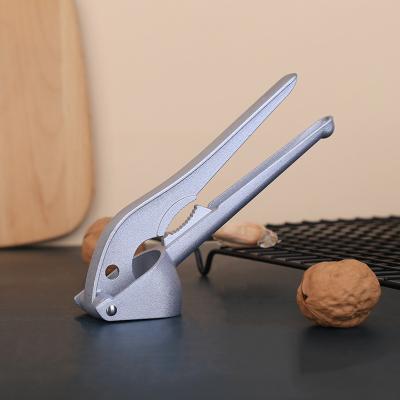 China Viable Kitchen Accessories Garlic Press Grater Stainless Steel Meat Grinder and Grinder with Silicone Peeler Roller Easy to Clean for sale