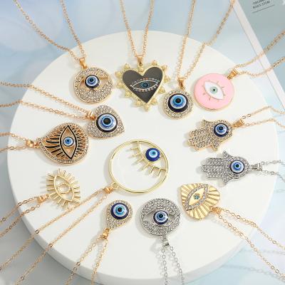 China FASHIONABLE Wholesale Alloy Gold Plated With Rhinestone Heart Eye Pendant Necklace For Women for sale