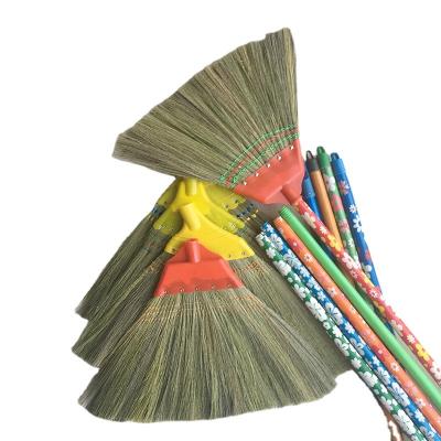 China Eco-friendly Hot Selling Colorful PVC Coated Wooden Stick Grass Broom for sale