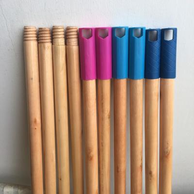 China Eco - Friendly Lacquered Broom Pip Cleaning Varnished Long Wooden Stick Handle With Machine Made Cap Grips for sale