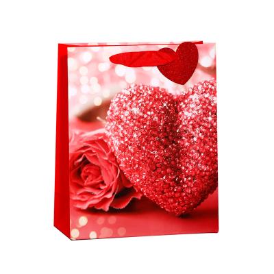 China Recyclable Ready Goods Red Heart Print Paper Bag for Wedding Return Gift Bags Wedding Valentine Packaging for sale