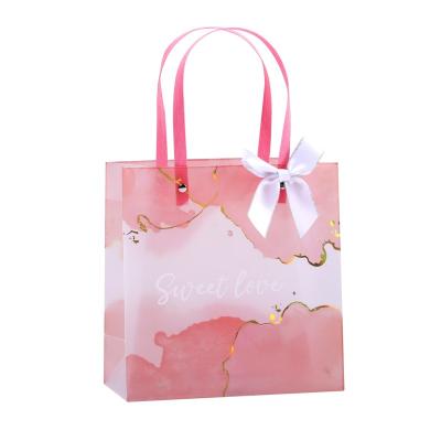 China Recyclable Sweet Love stand up pouch bags clear matte plastic gift bag custom for clothing small business party favor for sale