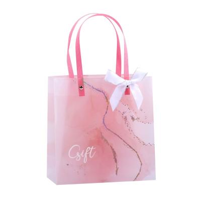 China Recyclable Pink transparent matte clothing plastic stand up pouch gift bags custom for small business bridal party favor for sale