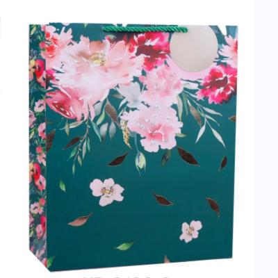 China Recyclable New arrival flowers floral paper gift bags with your own logo clothing for clothes for sale