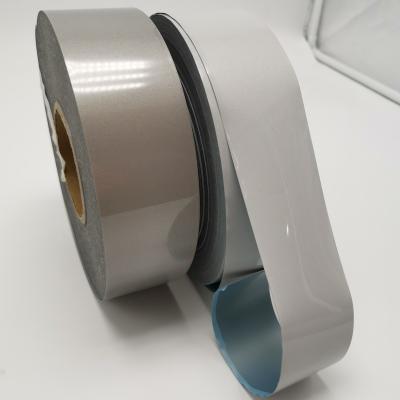 China Tearable Elastic Silver Reflective Heat Transfer Film / Tape For Garment for sale