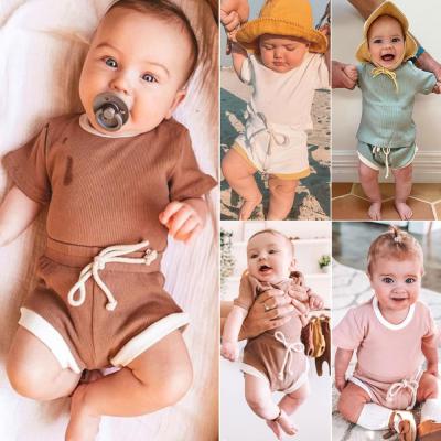 China QUICK DRY Multicolor Round Two Piece Tops Summer Newborn Solid Color Neck Toddler Infant Baby Clothing Sets for sale