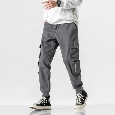 China 2021 Wholesale QUICK DRY Cotton Cargo Solid Dark Zippered Pants Overalls Pocket Plus Size Men's Pants And Trousers for sale