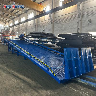 China 10 Meters Custom Moveable Loading Dock 10 Tons Fixed Height Mobile Forklift Ramp for sale