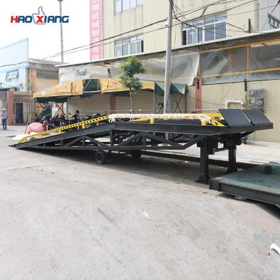 China 10 Tons Mobile Dock Ramp Diamond Mesh Hydraulic Loading Dock Ramps for sale