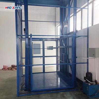 China Elevador hidráulico de carga de 2 pisos - capacidad de 4 toneladas, protección contra caídas, plataforma personalizable en venta