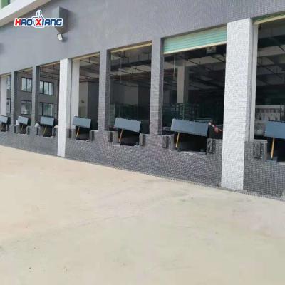 China 10 Ton Hydraulic Dock Plate Warehouse Loading And Unloading Platform for sale