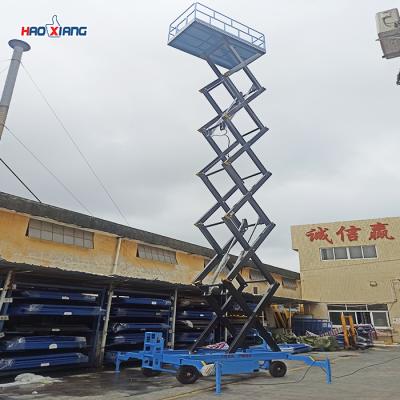 China Indoor Self Propelled Scissor Lift 1.5 Ton Mobile Scissor Platform for sale