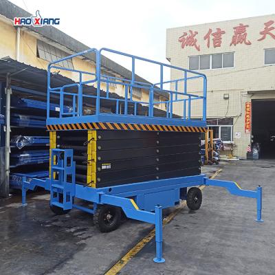 China 1.5T 4 Wheel Drive Scissor Lift Wheeled Mobile Hydraulic Scissor Lift for sale