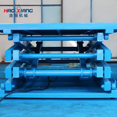 China Workbench Scissor Lift Hydraulic 4000kg Pallet Stationary Lift Platform for sale