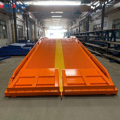 China 10 Ton Mobile Dock Ramp Steel Yellow For Efficient Loading Unloading for sale