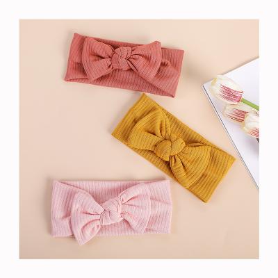 China Popular Infant Knitted Ribbed Stretch Bow Baby Headband Seamless Baby Hair Band Hair Accessories for sale