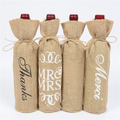 China Eco-Friendly Burlap Wine Bags Wine Gift Bags With Drawstrings Reusable Burlap Wine Bottle Covers With Strings for sale