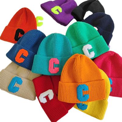 China New JOINT Hat Women Autumn Wool Letter Dropshipping Warm Knitted Hat Age-Reducing Hearing Protection Hat for sale