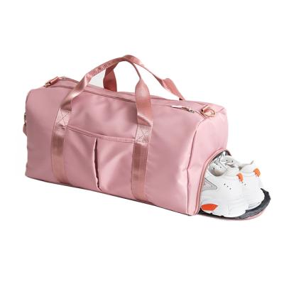 China Sports Shoulder Duffel Bag Custom Logo High Quality Waterproof Dry Custom Travel Luggage Go Out Pink Fitness Gym Bags for sale