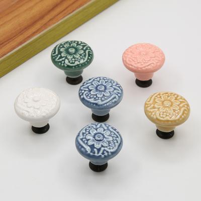 China Modern Embossed Knob And Cabinet Pulls Handles Decorative Kitchen Ceramic Cabinet Knobs for sale