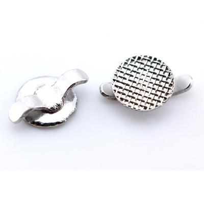 China Dental Orthodontic Metal Commode Mesh Base Bondable Lingual Button With Cleats for sale