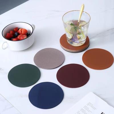 China Sustainable Custom Logo Leather Placemats Coasters PU Leather Cup Mat Coaster for sale