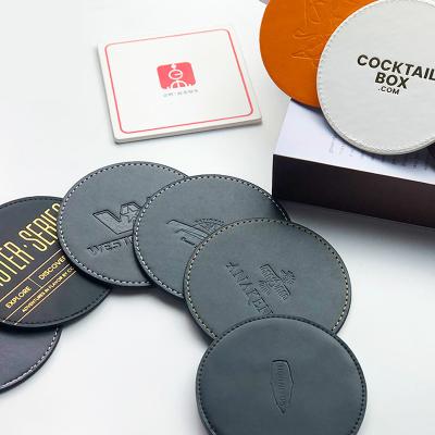 China Sustainable Custom Embossed Coining Logo Tea Coffee Cup Perfect Edge PU Leather Coaster for sale