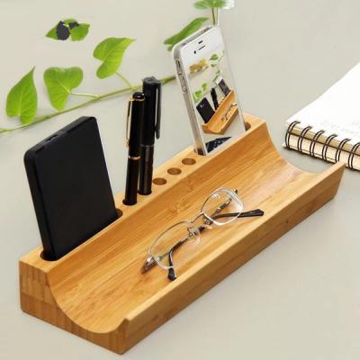 China Custom Wholesale High Quality Desktop Bamboo Box Mobile Phone Finish Wood Stand Flexible for sale