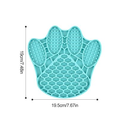 China Slow Food Mat Dispensing Feed Plate Lick Pad Cats Dogs Viable Silicone Pet Bowl Claw Shaped Pet Bowl for sale