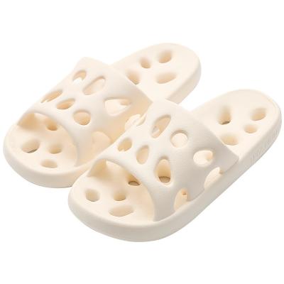 China Cushioning Indoor Indoor Home Men Women Hollow Out Slippers Spring Summer Hotel Couples Bathroom Slippers Slippers for sale