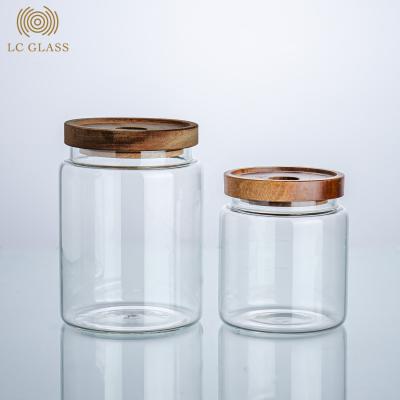 China Borosilicate Glass Storage Jar Sustainable Selling Food Container With Airtight Bamboo Flange Lid for sale