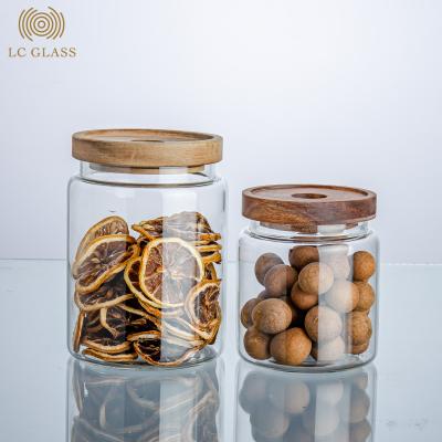 China Borosilicate Glass Storage Jar Sustainable Selling Food Container With Airtight Bamboo Flange Lid for sale