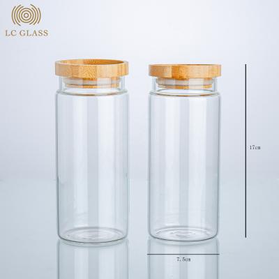 China Sustainable High Borosilicate Glass Storage Jar Food Container With Bamboo Lid for sale