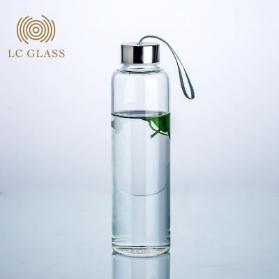 China Sustainable Cheap Glass Travel 500ml Custom Glass Water Bottle With Bamboo Lid And Silica Gel Set for sale