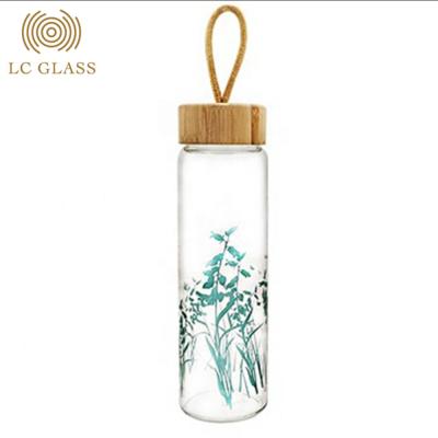 China Sustainable Eco Friendly Small Neck Sport Drink Jar Glass Water Bottle With Bamboo Lid for sale