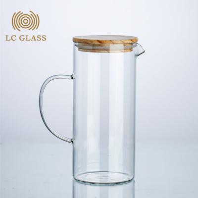 China Wholesale Beverage Borosilicate Juice Tea Water Glass Kettle With Bamboo Lid for sale