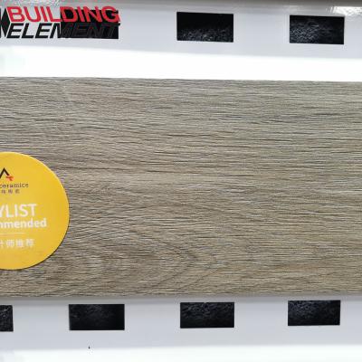 China Glazed metallic tiles the price of ceramic wood grain non-slip tiles is low, simple and fashionable 900x150 ceramic flooring glazed tiles for sale