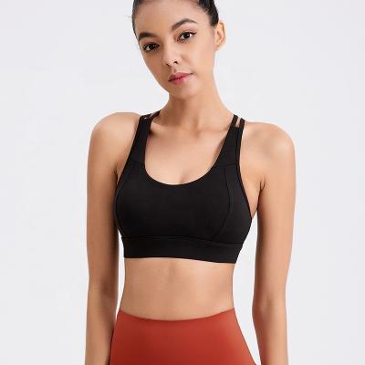 China Breathable Custom Sexy Sports Scoop Neckline Girl Yoga Bra Criss Cross Bra Top with Back Thin Strap and Mesh Fabric for sale