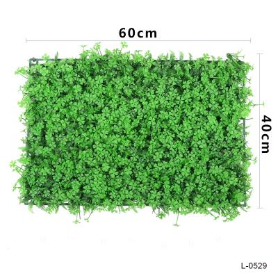 China Artificial Plant Wall Plastic Greenery Panels Wall Europe Grass Grass Wall For Home Decor for sale