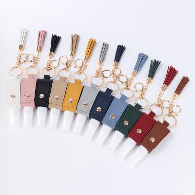 China Custom Fashion Bottle Spray Alcohol Hand Sanitizer Storage Pocket Key Chain Key Chain With Tassel Mini Sanitizer Key Holder Keychain for sale