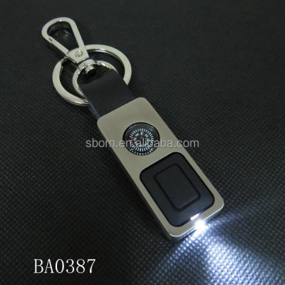 China Cheap Gift Metal Lovely LED Keychains With Compass Key Holder for sale