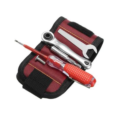 China Multi Functional Customized Strong Portable Constant Small Tool Holder Magnetic Wrist Band For Holding Nails Screw for sale